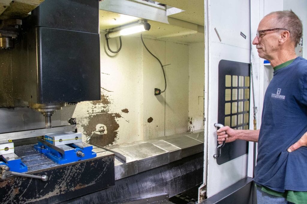 Titletown Manufacturing employee working