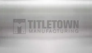 Titletown Manufacturing metal logo